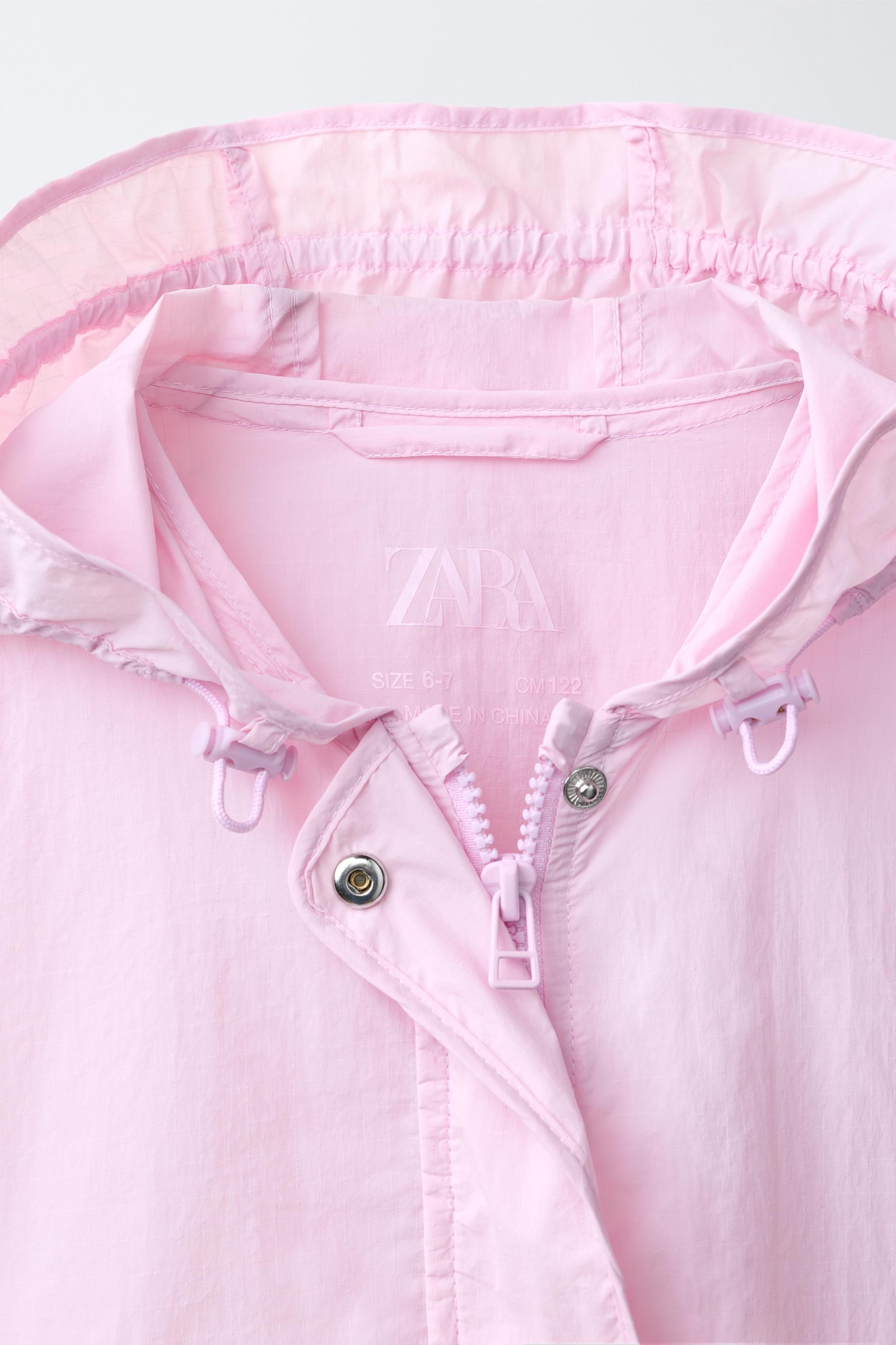 WATER REPELLENT HOODED RAINCOAT